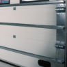 Raidisseur de porte de garage sectionnelle