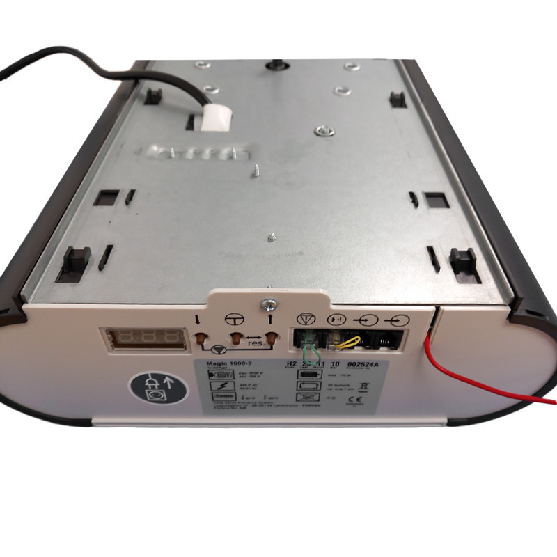 Vue arrière dézoomer d'une motorisation complète MAGIC 1000 Normstahl pour porte de garage K140521