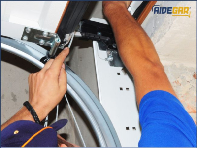 Réparation de porte de garage sectionnelle motorisée
