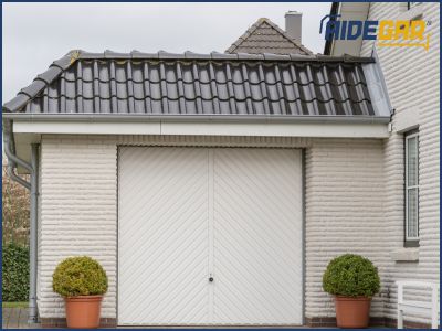Résoudre un problème de fermeture sur une porte de garage basculante manuelle 